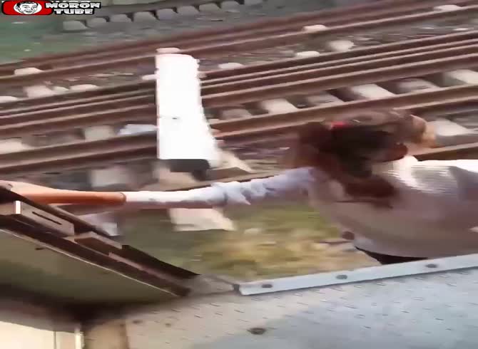 Video :When she attempts to exit the train, something goes awry